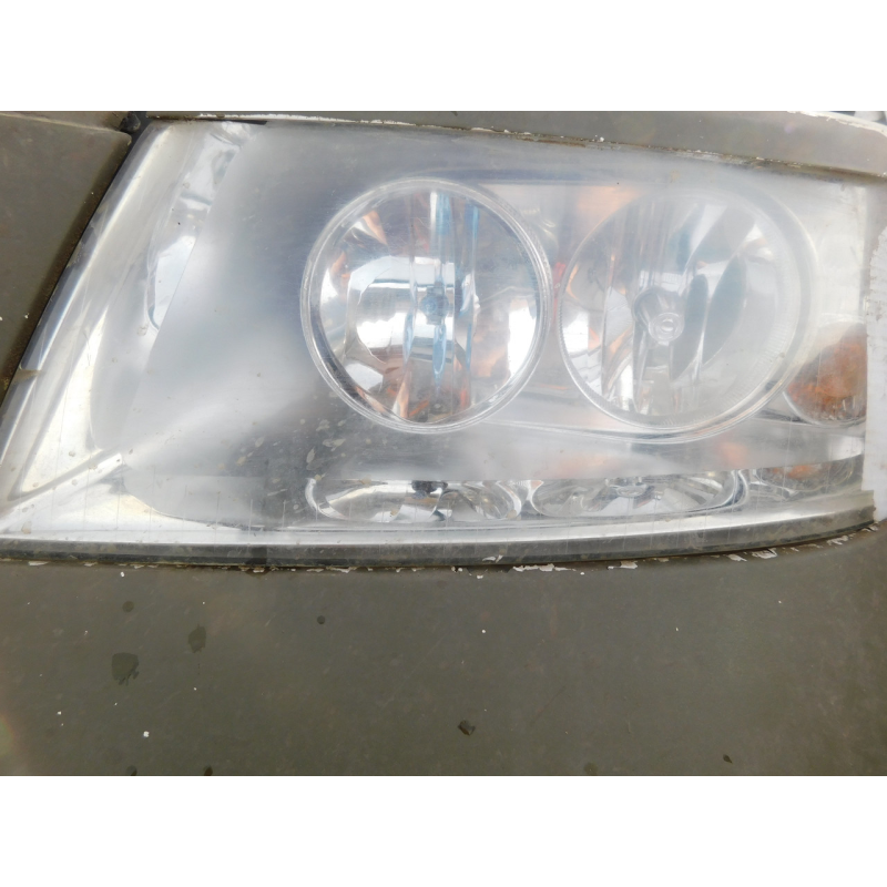 Фара передня ліва  VW TRANSPORTER T5  2003-2010p.