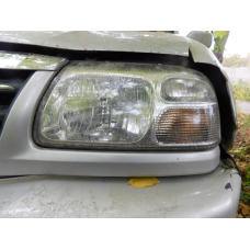 Фара передня ліва  SUZUKI GRAND VITARA