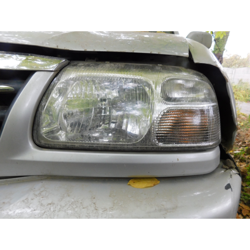 Фара передня ліва  SUZUKI GRAND VITARA