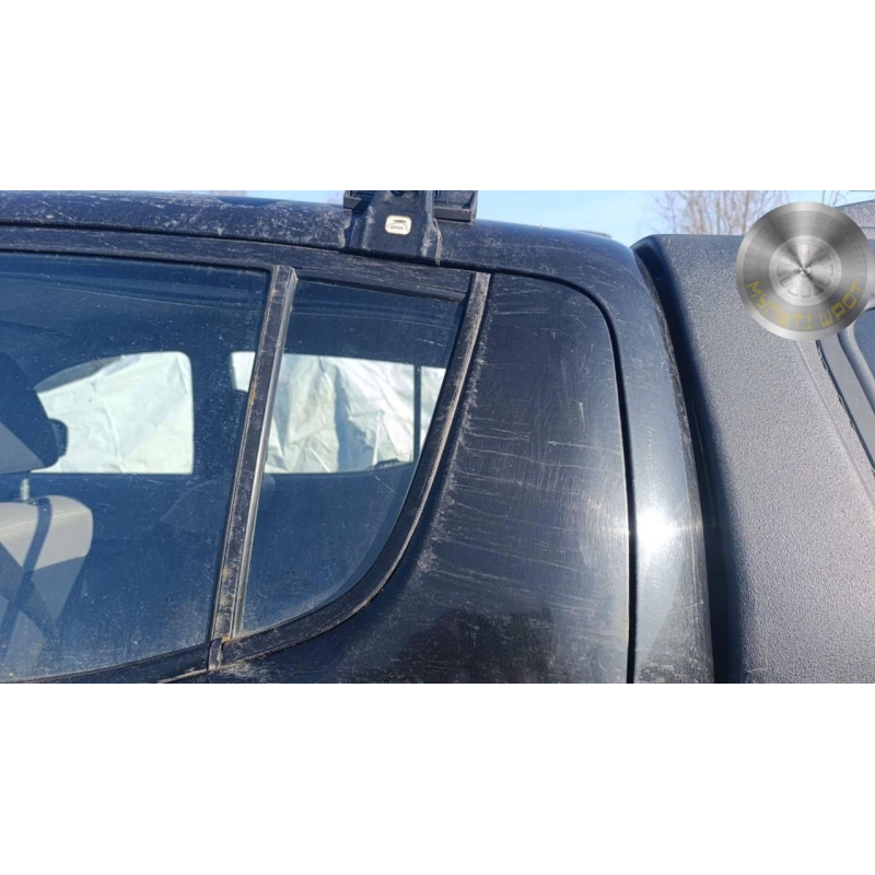 Скло заднє ліве дверей (глухе) Mitsubishi L200 2013 р. Скло заднє ліве дверей (глухе) Mitsubishi L200 2013 р.
