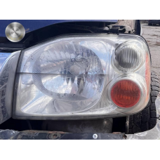 Фара передня ліва Nissan Navara D22