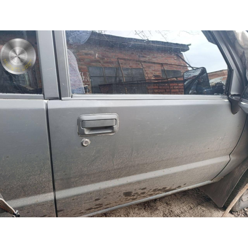 Двері передні праві Mitsubishi L200 (1990 рік) голі (1990 рік)