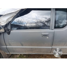 Двері передні ліві Mitsubishi L200 (1990 рік) голі