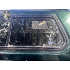 Скло кунга заднє ліве Mitsubishi L200 1996–2005 б/у
